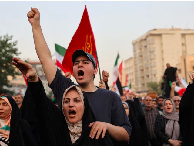 Fragile ceasefire holds as Trump promises peace talks with Iran